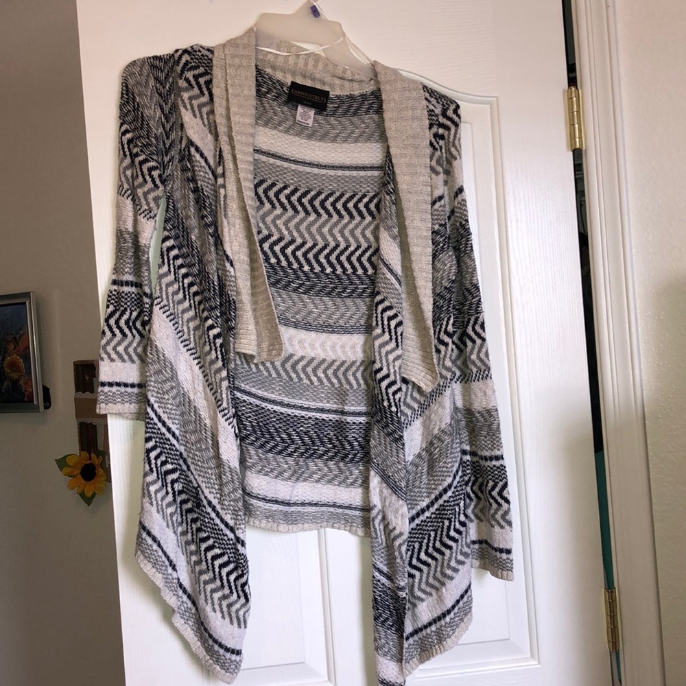 Navy, White, cream, and grey sweater size M